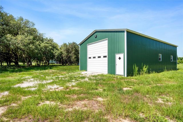 9045 LAKE HATCHINEHA RD, Haines City, FL 33844