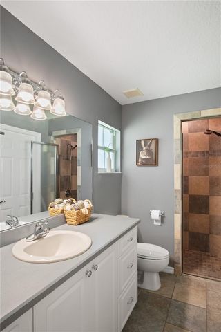 9045 LAKE HATCHINEHA RD, Haines City, FL 33844