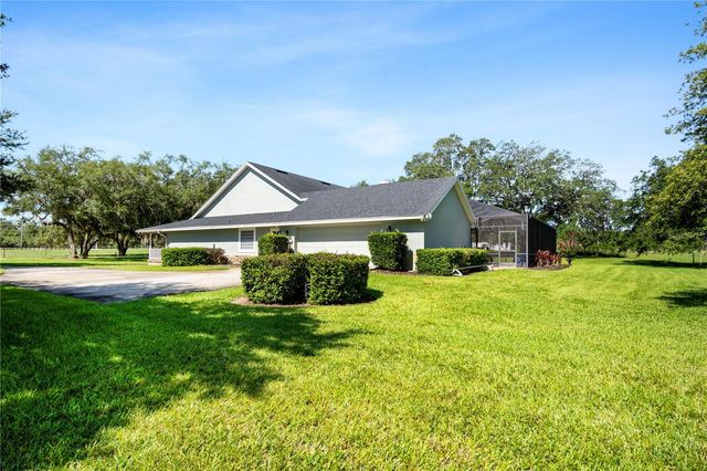 9045 LAKE HATCHINEHA RD, Haines City, FL 33844