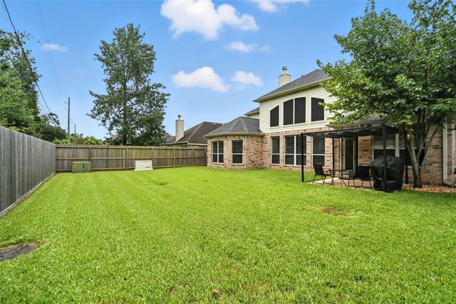 24214 Pine Canyon Falls Circle, Tomball, TX 77375