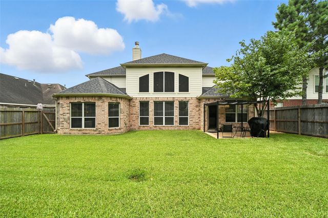 24214 Pine Canyon Falls Circle, Tomball, TX 77375