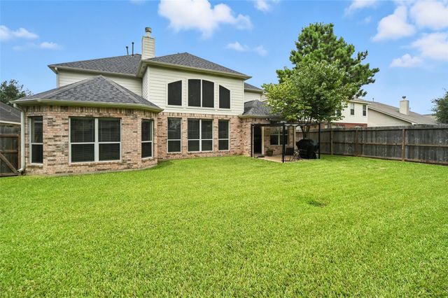 24214 Pine Canyon Falls Circle, Tomball, TX 77375