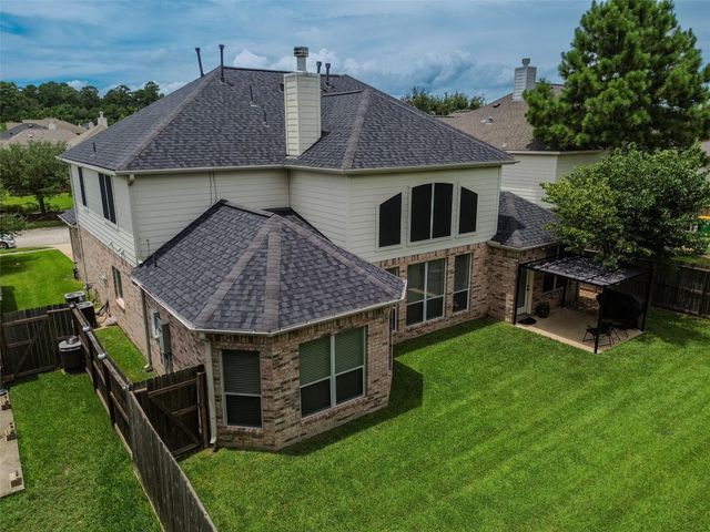 24214 Pine Canyon Falls Circle, Tomball, TX 77375