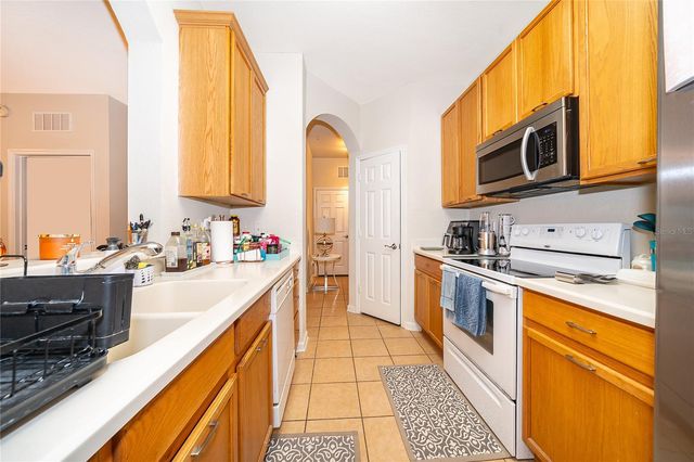 3326 ROBERT TRENT JONES DRIVE 107, Orlando, FL 32835