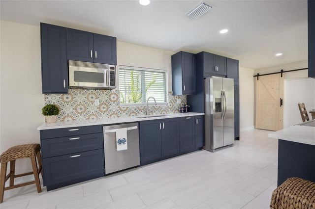 1794 SANTA BARBARA DR, Dunedin, FL 34698