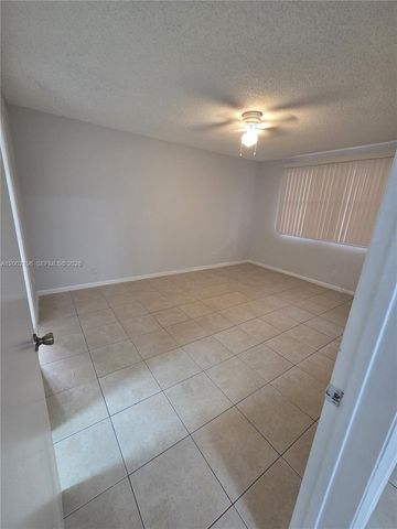 8871 Wiles Rd 208, Coral Springs, FL 33067