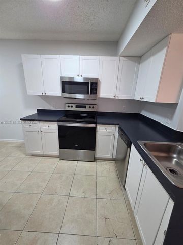 8871 Wiles Rd 208, Coral Springs, FL 33067