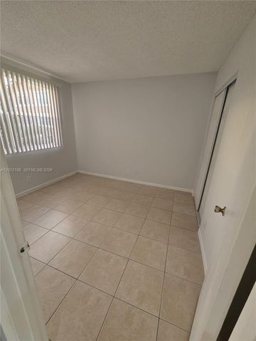 8871 Wiles Rd 208, Coral Springs, FL 33067