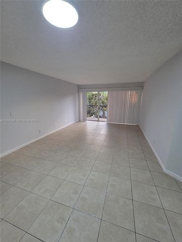 8871 Wiles Rd 208, Coral Springs, FL 33067