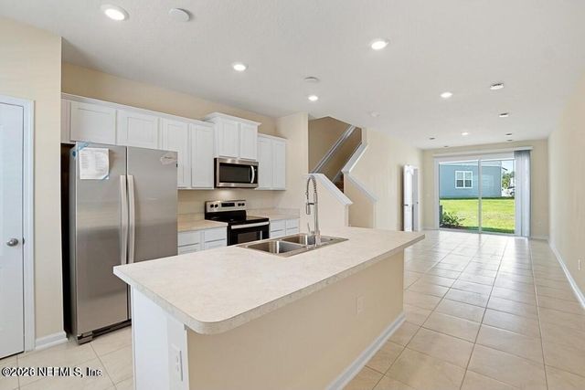 592 RUNNING WOODS Street, Orange Park, FL 32065