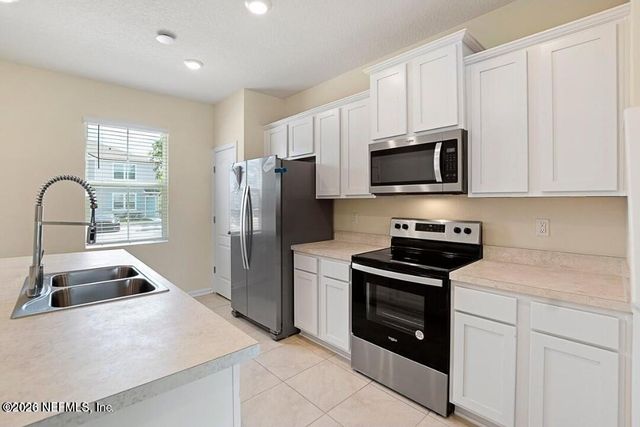 592 RUNNING WOODS Street, Orange Park, FL 32065