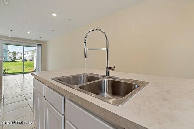 592 RUNNING WOODS Street, Orange Park, FL 32065