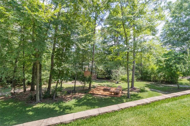 11302 Longmire Creek Court, Conroe, TX 77304