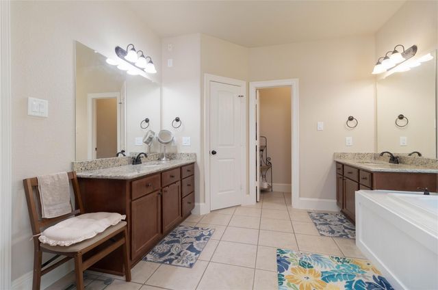 11302 Longmire Creek Court, Conroe, TX 77304