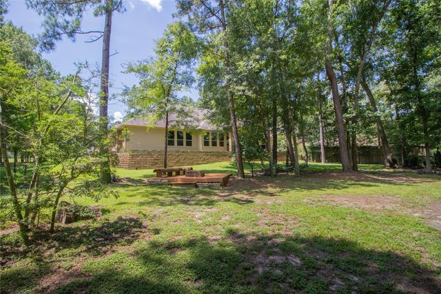 11302 Longmire Creek Court, Conroe, TX 77304