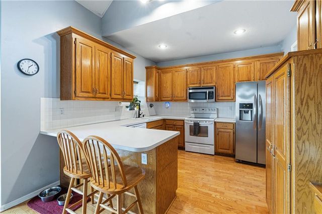 1112 Camelot Drive, Raymore, MO 64083