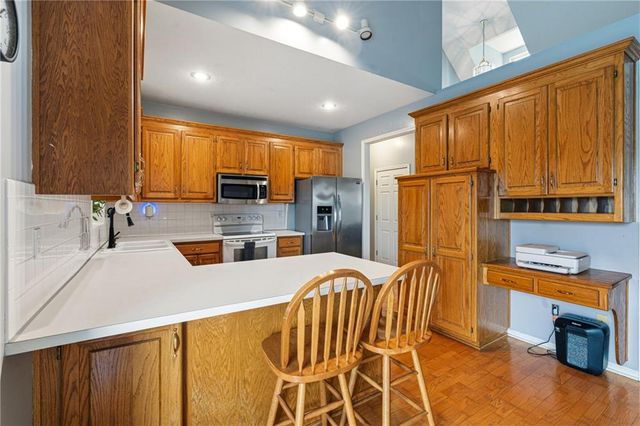 1112 Camelot Drive, Raymore, MO 64083