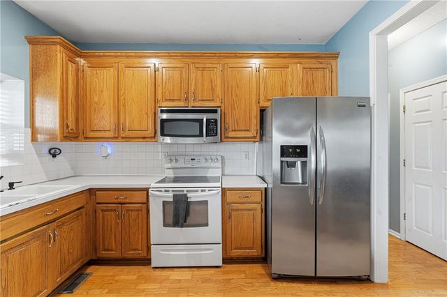1112 Camelot Drive, Raymore, MO 64083