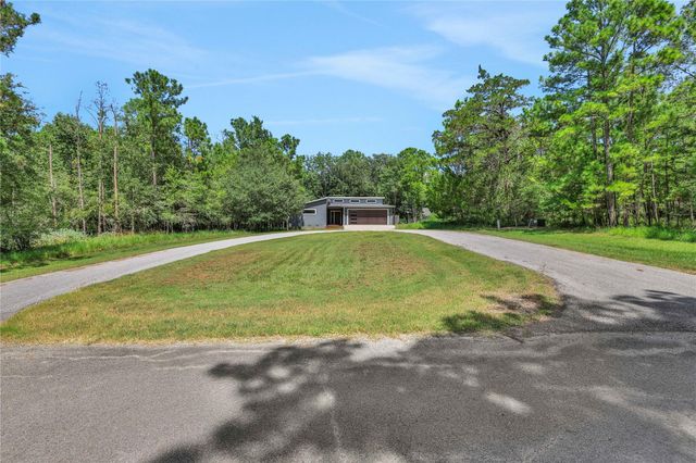 70 N Royale Greens Drive, Coldspring, TX 77331