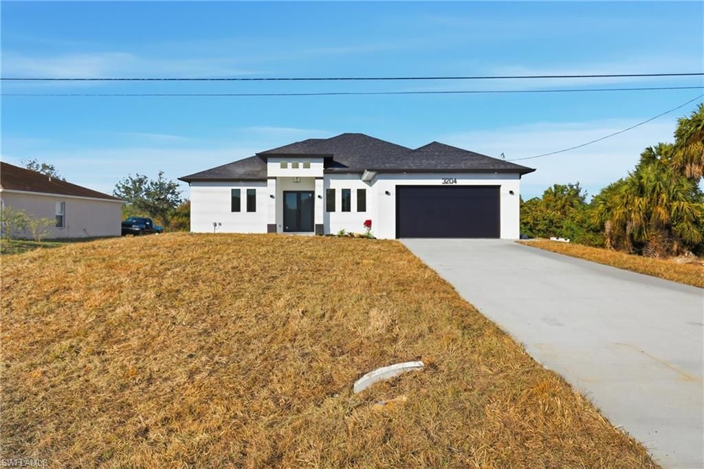 3204 Sunshine BLVD S, LEHIGH ACRES, FL 33976 — photo 2