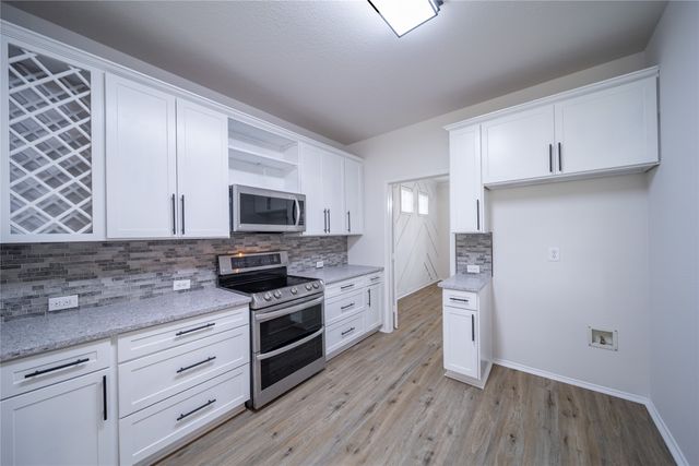 9601 Links Fairway Drive, Rowlett, TX 75089