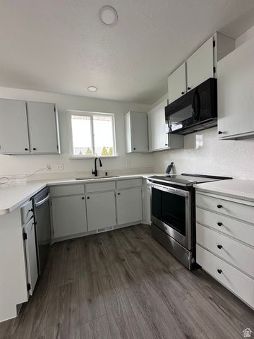 3876 S BURNINGHAM DR, West Valley City, UT 84119