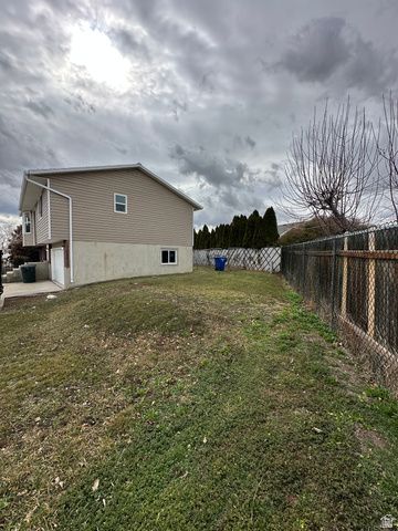 3876 S BURNINGHAM DR, West Valley City, UT 84119