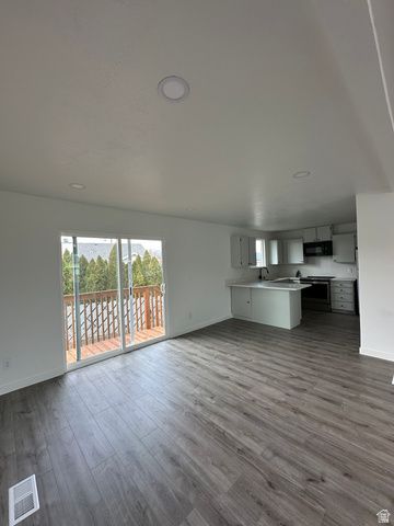 3876 S BURNINGHAM DR, West Valley City, UT 84119