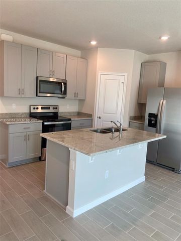 5629 Mentmore Drive, Mangonia Park, FL 33407