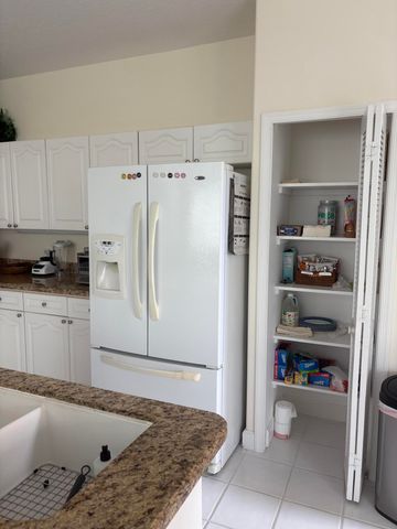 927 Augusta Pointe Drive, Palm Beach Gardens, FL 33418