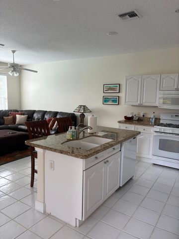 927 Augusta Pointe Drive, Palm Beach Gardens, FL 33418