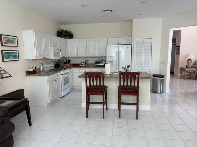 927 Augusta Pointe Drive, Palm Beach Gardens, FL 33418