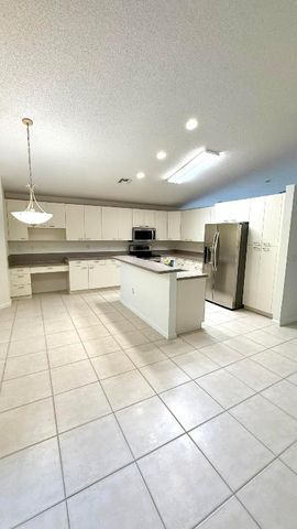 6166 Cotton Rose Lane, Lake Worth, FL 33467