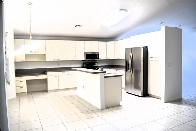 6166 Cotton Rose Lane, Lake Worth, FL 33467