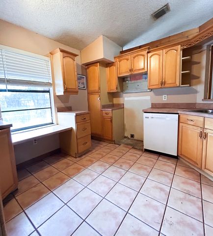 1898 SW Lofgren Avenue, Port St. Lucie, Port St Lucie, FL 34953