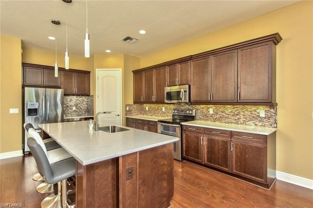 1614 Serrano CIR, Naples, FL 34105