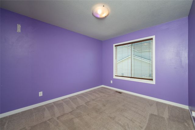403 Lacy Circle NE, Mitchellville, IA 50169