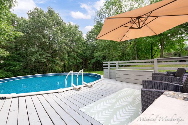 6998 Riverwood Drive, Otisco Twp, MI 48809