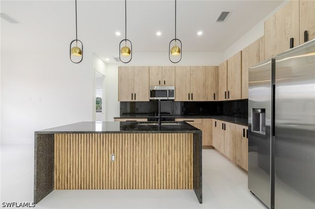 134 Carey AVE S, Lehigh Acres, FL 33974