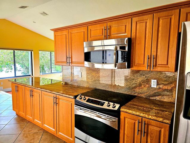 566 Village Lake Drive, Weston, FL 33326