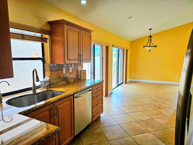 566 Village Lake Drive, Weston, FL 33326
