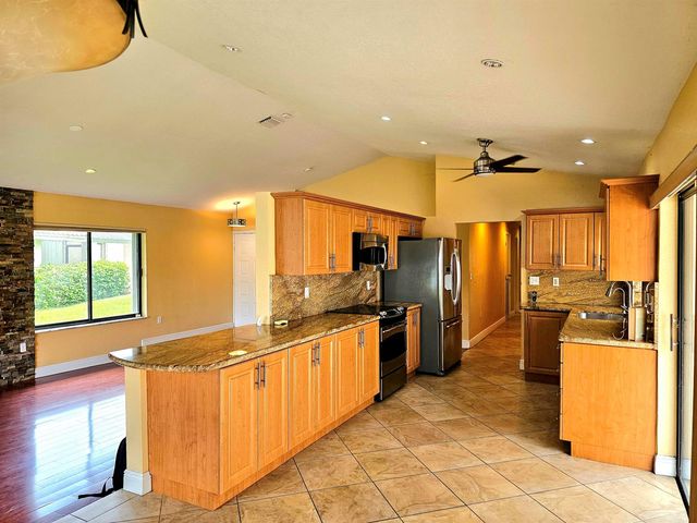 566 Village Lake Drive, Weston, FL 33326