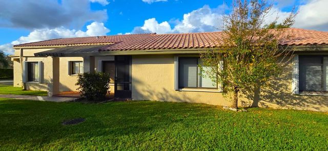 566 Village Lake Drive, Weston, FL 33326