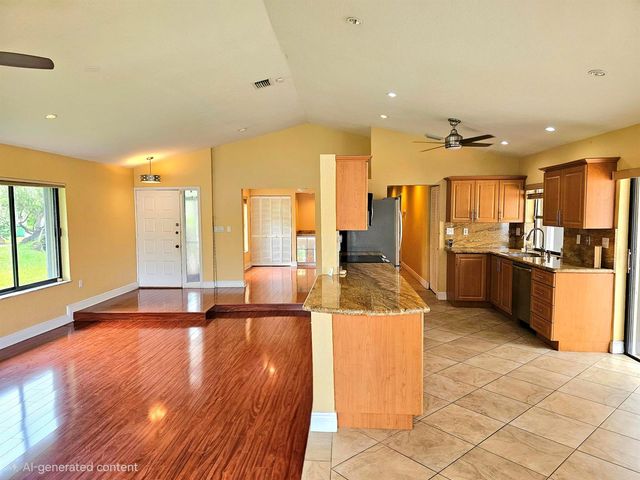566 Village Lake Drive, Weston, FL 33326