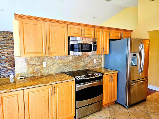 566 Village Lake Drive, Weston, FL 33326