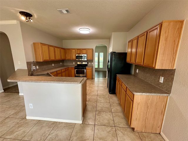 1039 N Teal Estates Circle, Fresno, TX 77545