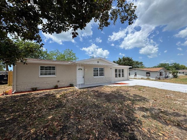 12801 COLLEGE HILL DRIVE, Hudson, FL 34667