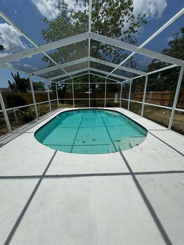 12801 COLLEGE HILL DRIVE, Hudson, FL 34667