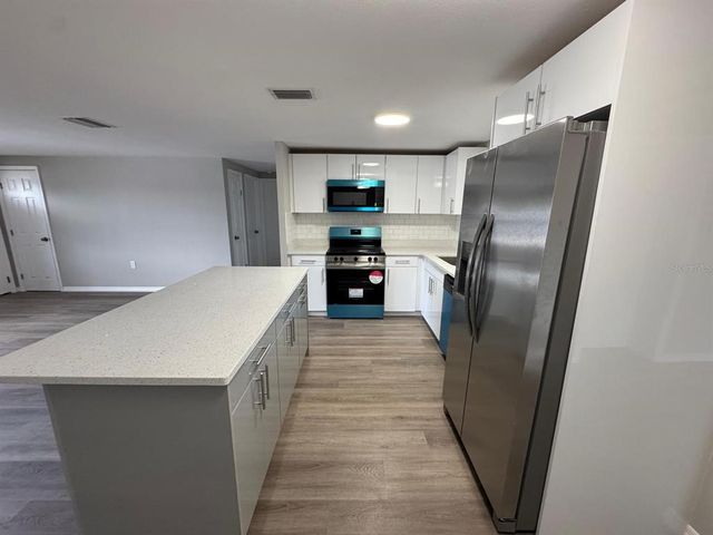 12801 COLLEGE HILL DRIVE, Hudson, FL 34667