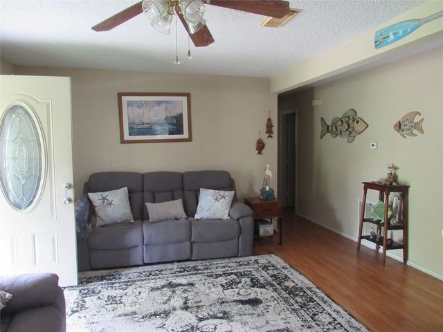242 Sir Lancelot Drive N, Sargent, TX 77414